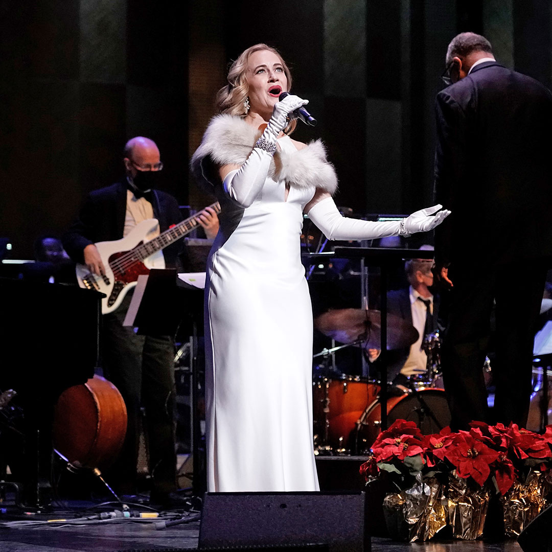 Utah Symphony Holiday Pops concert in Ogden featuring Broadway vocalist Mamie Parris with orchestra and holiday-lit stage