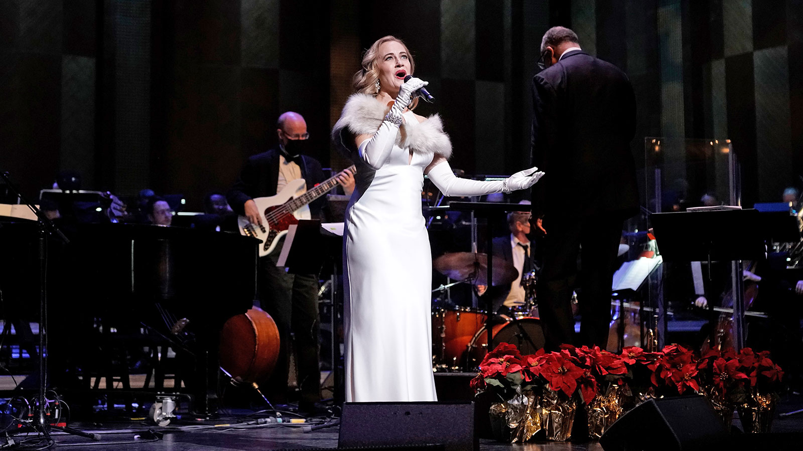 Utah Symphony Holiday Pops concert in Ogden featuring Broadway vocalist Mamie Parris with orchestra and holiday-lit stage